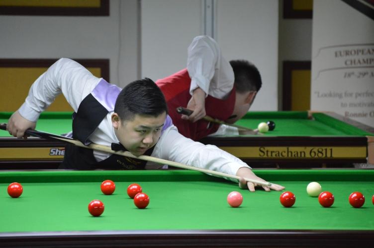 Lam pulls out 124 break to draw level.